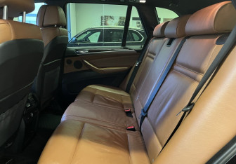 Подержанный автомобиль BMW X5 2009 года (14 фото)