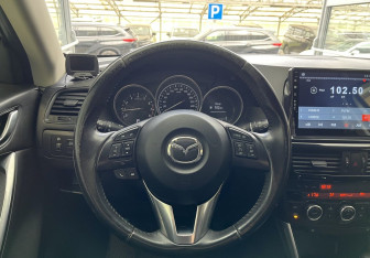 Подержанный автомобиль Mazda CX-5 2014 года (9 фото)