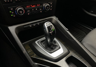 Подержанный автомобиль BMW X1 2012 года (14 фото)