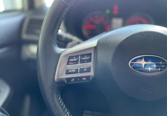 Подержанный автомобиль Subaru XV 2014 года (13 фото)