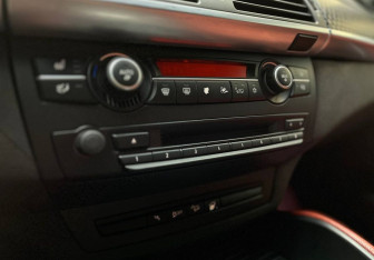 Подержанный автомобиль BMW X6 2013 года (15 фото)