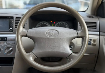 Подержанный автомобиль Toyota Corolla Wagon 2004 года (11 фото)