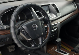 Подержанный автомобиль Nissan Teana 2009 года (11 фото)