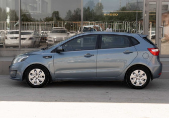 Подержанный автомобиль Kia Rio Hatchback 2015 года (8 фото)