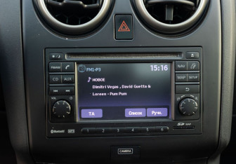 Подержанный автомобиль Nissan Qashqai 2013 года (14 фото)