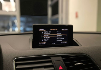 Подержанный автомобиль Audi Q3 2013 года (11 фото)