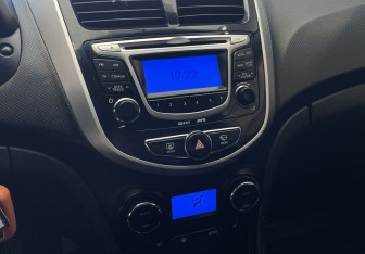 Подержанный автомобиль Hyundai Solaris Sedan 2012 года (14 фото)