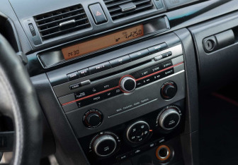 Подержанный автомобиль Mazda 3 Sedan 2008 года (14 фото)