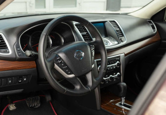 Подержанный автомобиль Nissan Teana 2010 года (11 фото)