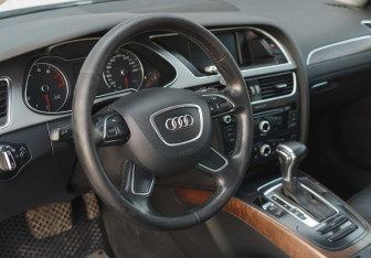 Подержанный автомобиль Audi A4 Sedan 2014 года (11 фото)