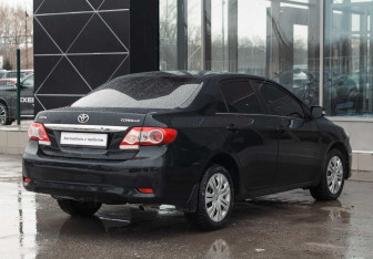 Подержанный автомобиль Toyota Corolla Sedan 2013 года (5 фото)