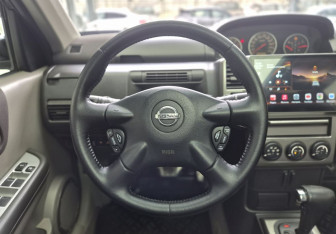Подержанный автомобиль Nissan X-Trail 2006 года (9 фото)
