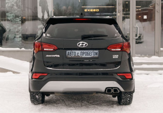 Подержанный автомобиль Hyundai Santa Fe 2016 года (6 фото)