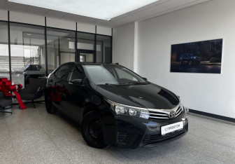 Подержанный автомобиль Toyota Corolla Sedan 2014 года (3 фото)