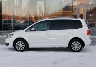Подержанный автомобиль Volkswagen Touran 2011 года (8 фото)