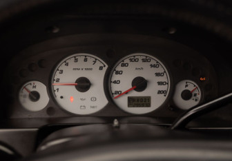 Подержанный автомобиль Ford Maverick 2002 года (12 фото)