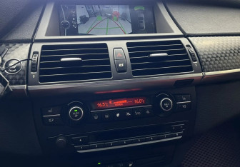 Подержанный автомобиль BMW X6 2013 года (12 фото)