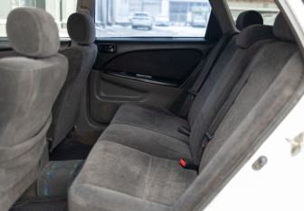 Подержанный автомобиль Toyota Caldina 2000 года (16 фото)