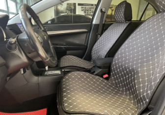 Подержанный автомобиль Mitsubishi Lancer Sedan 2013 года (13 фото)