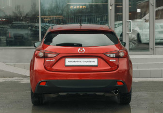 Подержанный автомобиль Mazda 3 Hatchback 2014 года (6 фото)