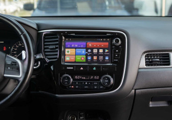 Подержанный автомобиль Mitsubishi Outlander 2014 года (14 фото)
