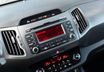 Подержанный автомобиль Kia Sportage 2011 года (14 фото)