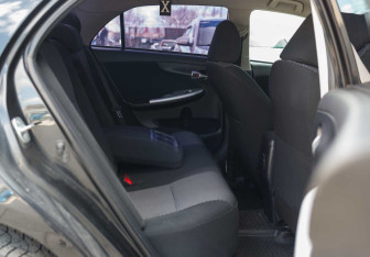 Подержанный автомобиль Toyota Corolla Sedan 2013 года (18 фото)