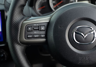 Подержанный автомобиль Mazda Demio 2014 года (12 фото)