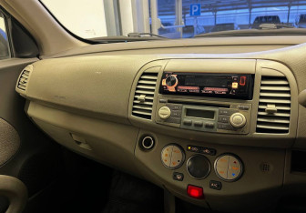 Подержанный автомобиль Nissan March Hatchback 2005 года (9 фото)