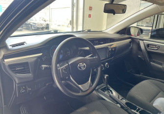 Подержанный автомобиль Toyota Corolla Sedan 2014 года (7 фото)