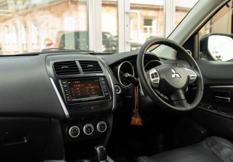 Подержанный автомобиль Mitsubishi RVR Suv 2010 года (10 фото)