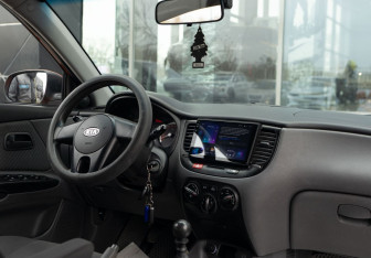 Подержанный автомобиль Kia Rio Hatchback 2009 года (12 фото)