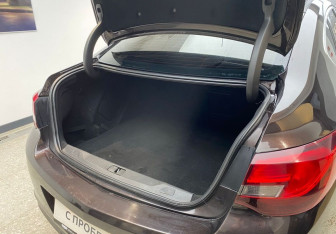 Подержанный автомобиль Opel Astra Sedan 2014 года (7 фото)