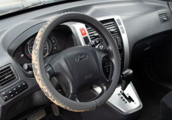 Подержанный автомобиль Hyundai Tucson 2008 года (11 фото)