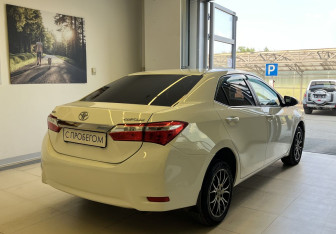 Подержанный автомобиль Toyota Corolla Sedan 2013 года (4 фото)