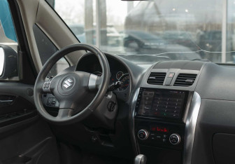 Подержанный автомобиль Suzuki SX4 Hatchback 2010 года (10 фото)