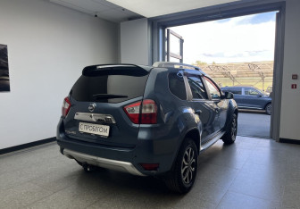 Подержанный автомобиль Nissan Terrano 2015 года (4 фото)