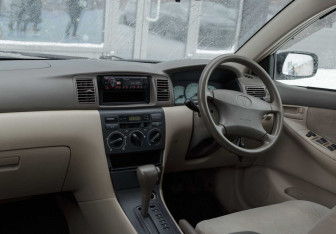 Подержанный автомобиль Toyota Corolla Wagon 2002 года (10 фото)