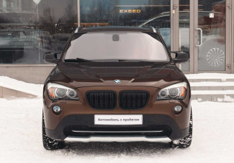 Подержанный автомобиль BMW X1 2011 года (2 фото)