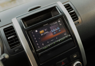 Подержанный автомобиль Nissan X-Trail 2013 года (13 фото)