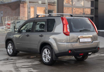 Подержанный автомобиль Nissan X-Trail 2014 года (7 фото)