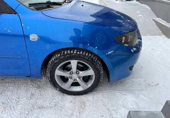 Подержанный автомобиль Mazda 3 Sedan 2005 года (9 фото)