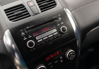 Подержанный автомобиль Suzuki SX4 Hatchback 2012 года (14 фото)