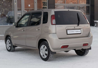 Подержанный автомобиль Suzuki Swift Hatchback 2004 года (7 фото)