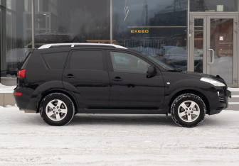 Подержанный автомобиль Peugeot 4007 2012 года (4 фото)