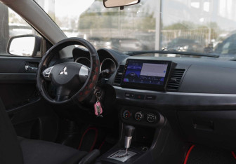 Подержанный автомобиль Mitsubishi Lancer Sedan 2008 года (10 фото)