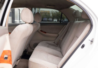 Подержанный автомобиль Toyota Corolla Sedan 2001 года (18 фото)