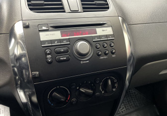 Подержанный автомобиль Suzuki SX4 Hatchback 2012 года (15 фото)