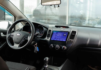 Подержанный автомобиль Kia Cerato Sedan 2013 года (10 фото)