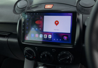 Подержанный автомобиль Mazda Demio 2014 года (14 фото)